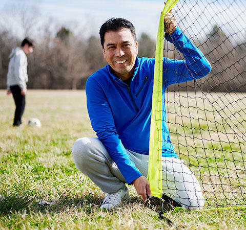 Mark on soccer field setting up net